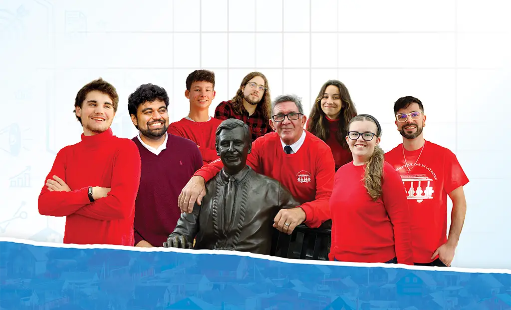 The West Media Group team gathered around the Fred Rogers statue in their hometown of Latrobe, Pennsylvania.